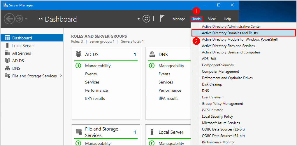Server Manager Dashboard with the Tools menu open and Active Directory Domains and Trusts highlighted