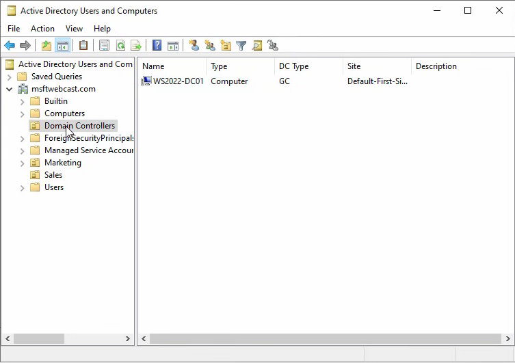 Active Directory Users and Computers tree view of OUs including the built-in Domain Controllers OU
