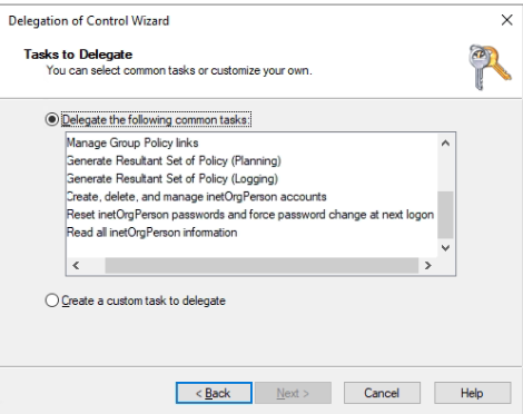 Active Directory Delegation of Control Wizard - Common Tasks page showing the eleven built-in delegation task checkboxes including create/delete/manage user accounts, reset passwords, manage group policy links, and inetOrgPerson tasks