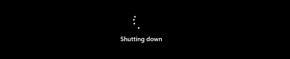 Win11-VM01 Virtual Machine Connection window showing the guest OS in mid-shutdown to satisfy the file-lock prerequisite before the VHDX file can be converted