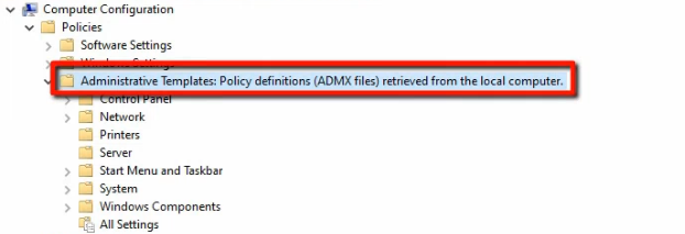 Group Policy Management Editor open on the Default Domain Policy with Computer Configuration Policies Administrative Templates selected; the description banner at the top reads Policy definitions ADMX files retrieved from the local computer indicating no central store exists yet