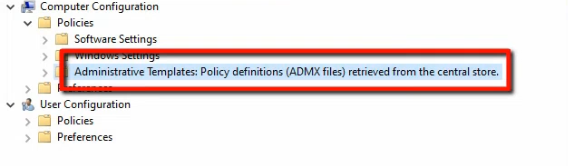 Group Policy Management Editor reopened on the same Default Domain Policy with the description banner now reading Policy definitions ADMX files retrieved from the central store confirming the setup landed correctly