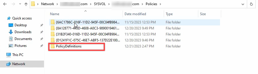 File Explorer at the SYSVOL Policies path showing the existing PolicyDefinitions folder that holds the current central-store ADMX templates before the update