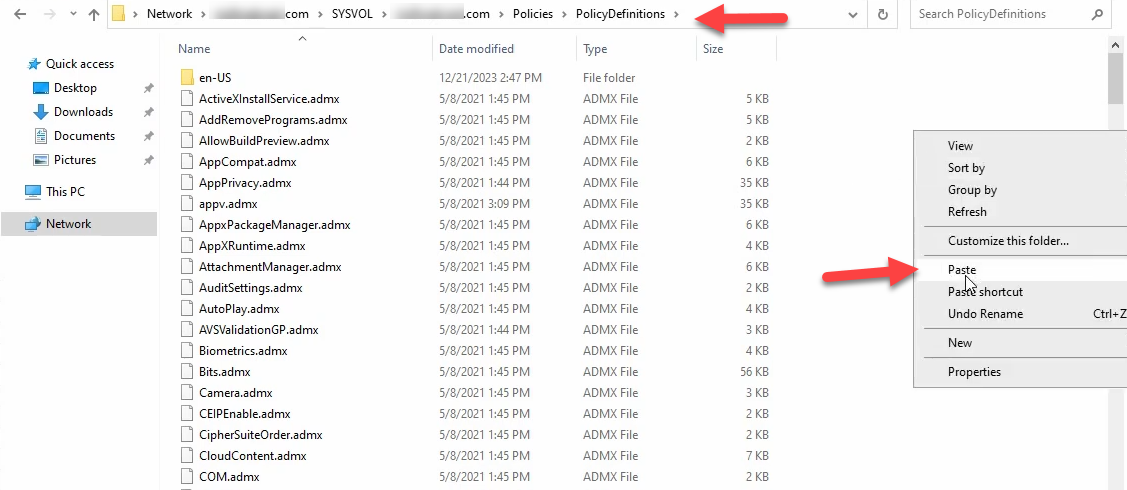 File Explorer at the SYSVOL central-store PolicyDefinitions folder with paste pending showing the destination where the new templates will land