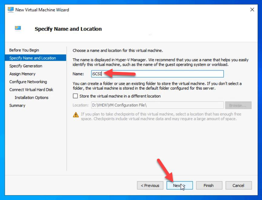 Specify Name and Location step with the VM name set to iSCSI which describes its role as the SAN emulator for the cluster