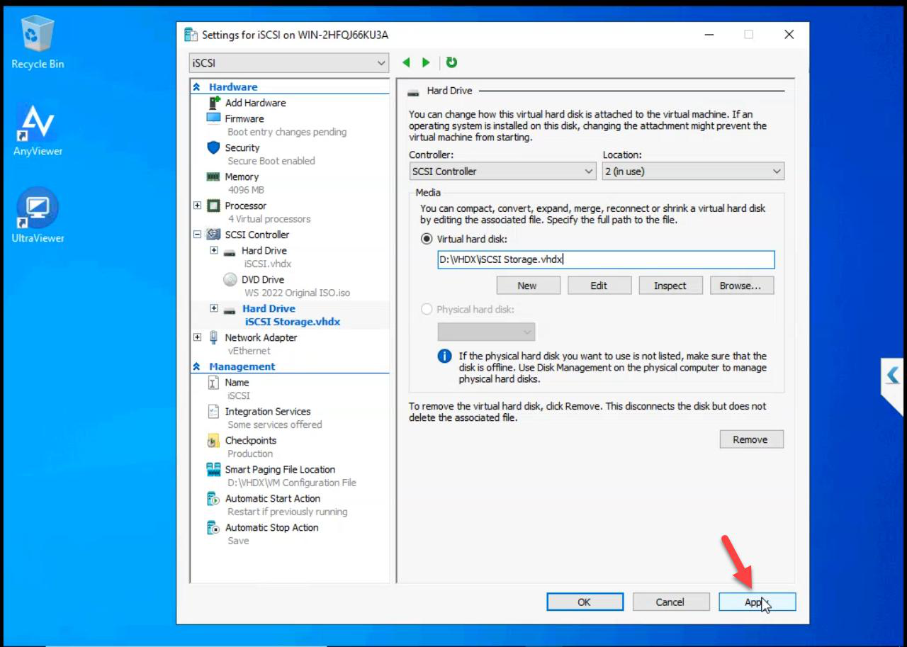 VM Settings dialog Apply button being clicked to attach the newly created disk to the iSCSI VM