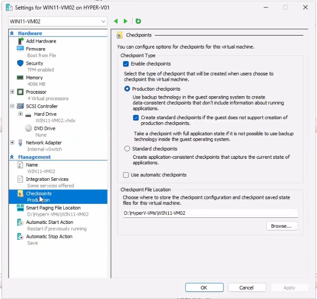 Hyper-V Manager Settings dialog open on a VM with the Management section expanded and the Checkpoints node selected showing the radio buttons to choose Standard or Production checkpoint type plus the fallback option and the storage location field