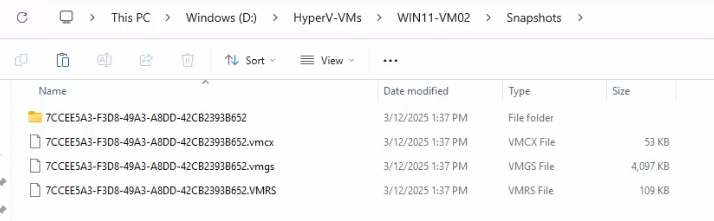 File Explorer at the VM Snapshots folder showing the .vmcx, .vmrs, .vmgs config and state files plus the corresponding .avhdx differencing disk that hold the snapshot data