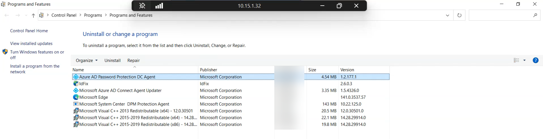 Network Connections control panel applet open after the controller comes back, with the LAN adapter showing static IPv4 details and bound to the domain DNS, confirming the host returned to its expected network identity