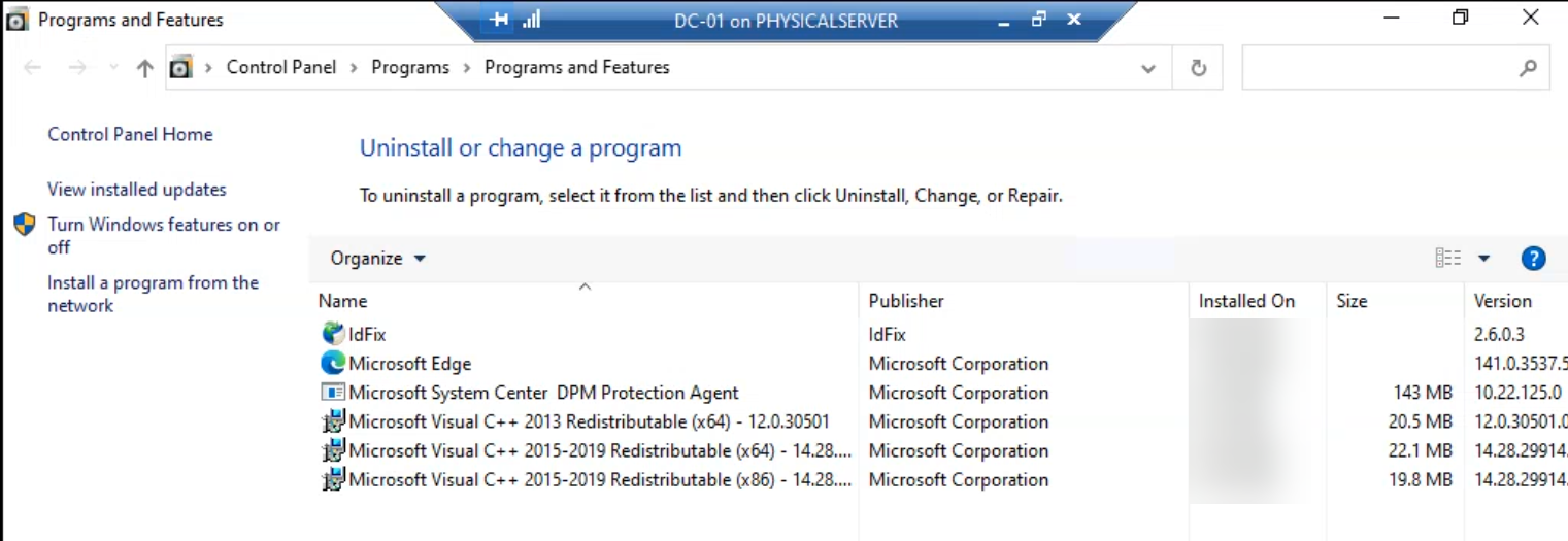 Programs and Features on the same controller after the uninstall, with the agent entry gone from the installed-program list, confirming the controller is back to its pre-deployment state