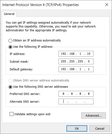 Windows guest VM Internet Protocol Version 4 properties dialog showing the static IPv4 address 192.168.1.11, subnet mask 255.255.255.0, default gateway 192.168.1.1, and DNS 8.8.8.8, the IP plan that lets the guest reach the host gateway and resolve names externally