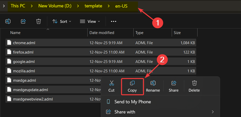 File Explorer showing the en-US subdirectory inside an extracted policy template bundle with the matching .adml language files visible, the source for the language-specific component of the policy templates