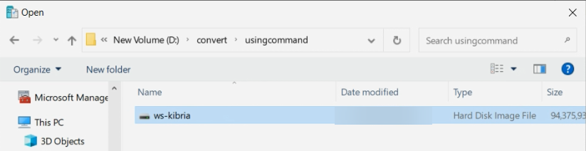 Windows File Explorer at the destination path showing the freshly converted .vhdx file appearing alongside the original .vmdk, the visual confirmation that ConvertTo-MvmcVirtualHardDisk completed successfully