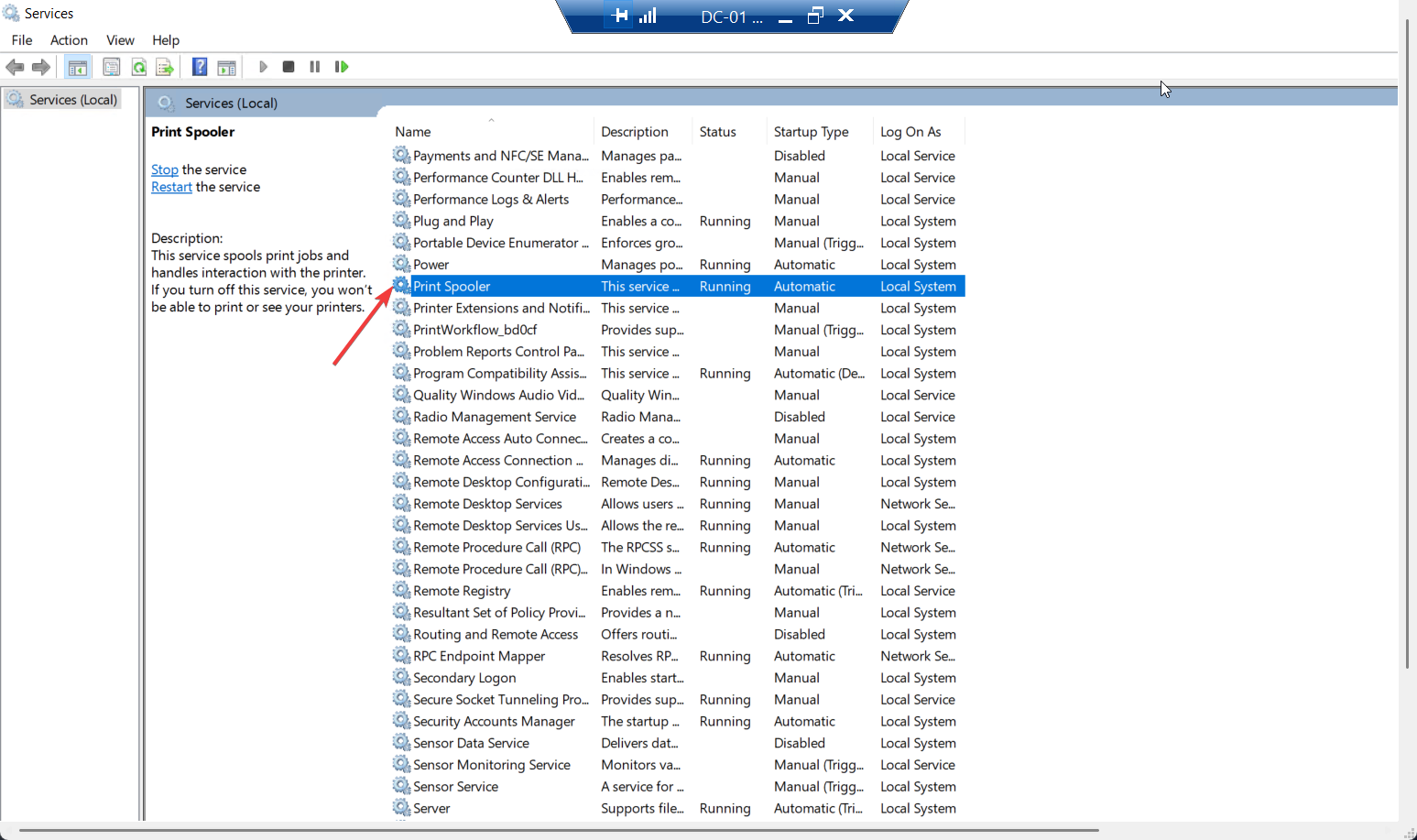Services console (services.msc) on a Domain Controller showing the Print Spooler service in the Running state with Startup type Automatic, the as-shipped default state that this post sets out to change