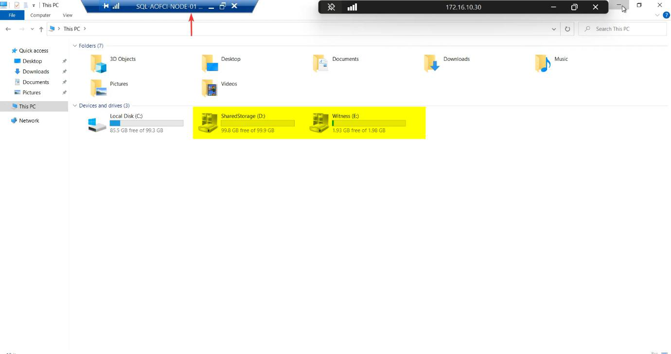 File Explorer on Node-01 showing the SQL-Data and Quorum-Witness drives mounted with the distinctive cluster disk icon (drive with a small chain link), the visual cue that Cluster Service now owns the disks