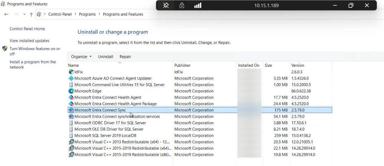 Final Configuration Complete page with the Exit button highlighted, the summary of what was installed and the confirmation that initial sync has started in the background