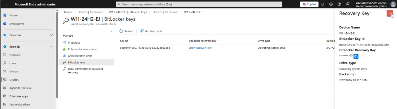 Microsoft Entra Admin Center Devices All Devices page drilled into the test device blade with the BitLocker Keys section expanded showing one or more recovery key IDs confirming the recovery password has successfully escrowed up to the cloud