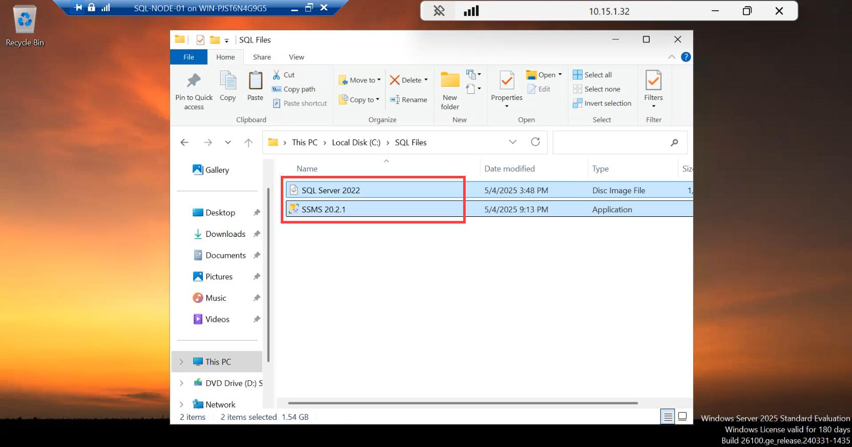 File Explorer showing the SQL Server 2022 ISO and SSMS installer files copied or downloaded onto the VM