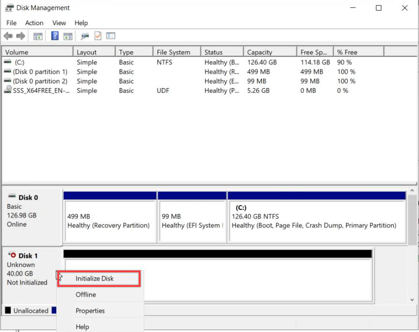 Disk Management with the new disk online and the Initialize Disk dialog open