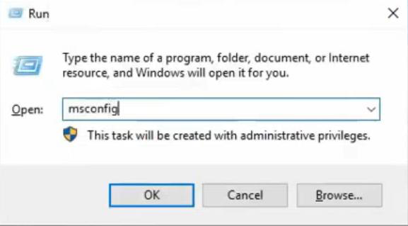 Run dialog with msconfig command typed to open System Configuration utility